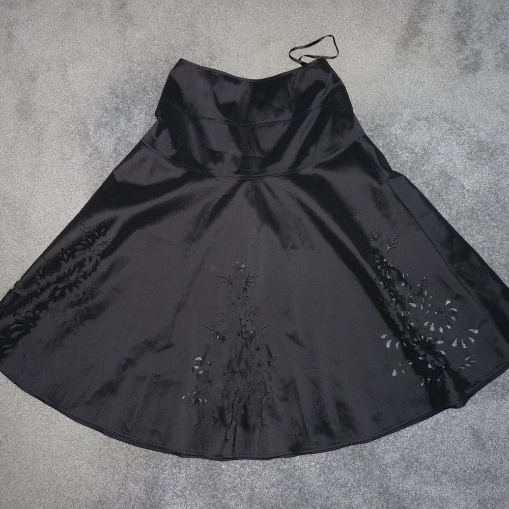 Black bell shirt with cutouts and beading